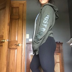 Army green Nike zip up